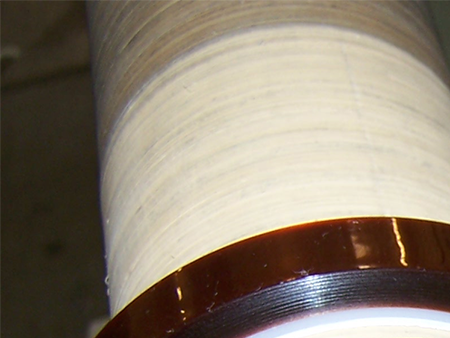 Single Knife Slitting Service from ATS for Tapes, Films, Fabrics, and Elastomer
